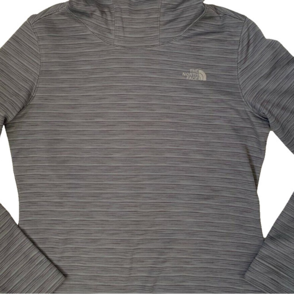 The North Face slate blue Long Sleeve pullover is fleecelined drawcord cowl neck